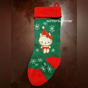World Market Hello Kitty Sanrio Christmas Stocking Santa Snowflakes. Red /Green